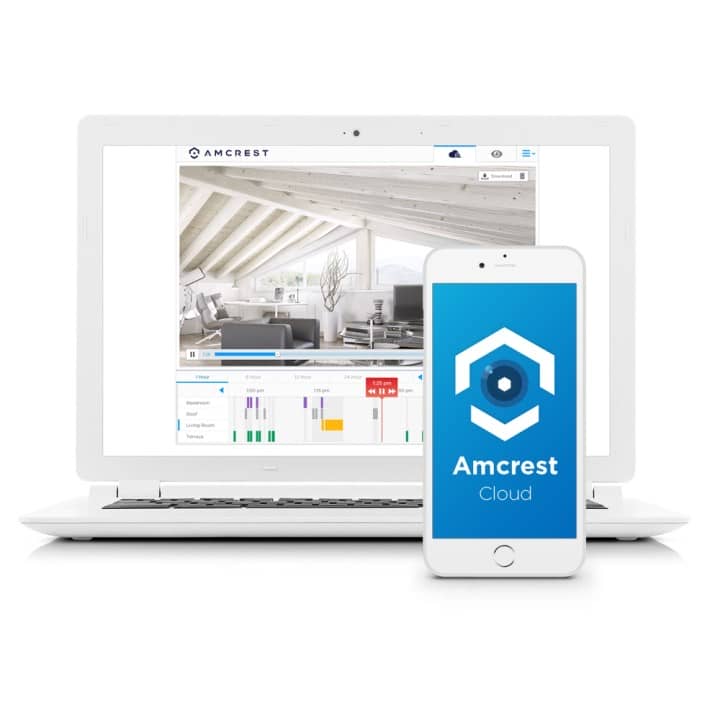 A phone with the Amcrest app loading, in front of a computer with a camera feed.
