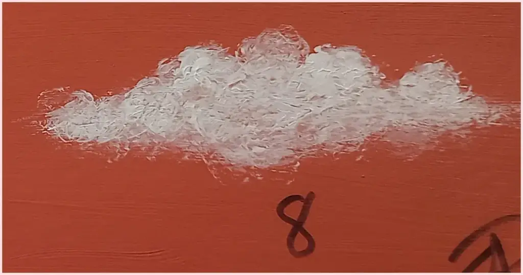 A fun fluffy white cloud painted by using fingers.