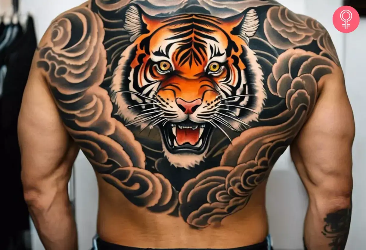 A man with a Japanese tiger tattoo on his back