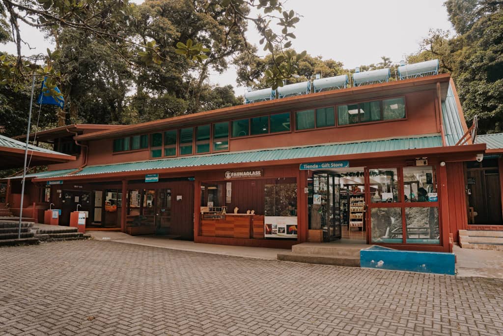 brown lodge with gift store and restaurant at Monteverde Cloud Forest reserve