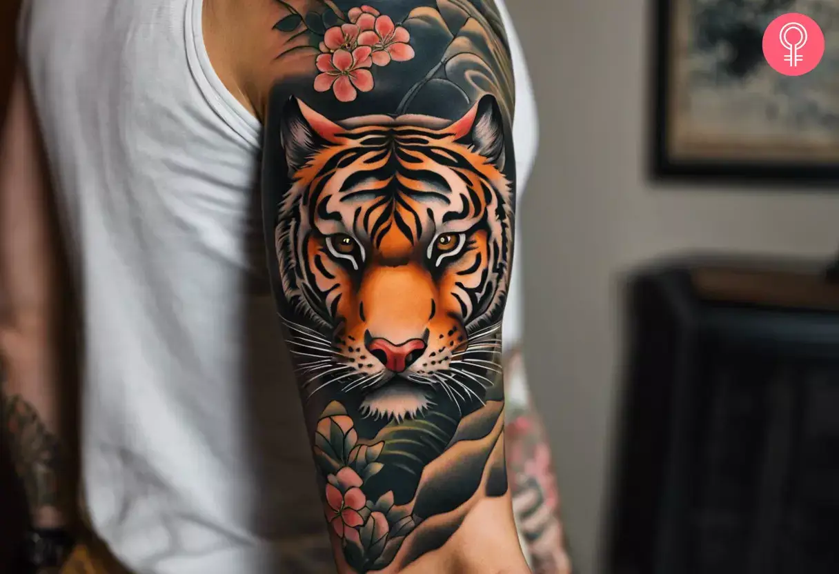 A man with a Japanese tiger quarter sleeve tattoo