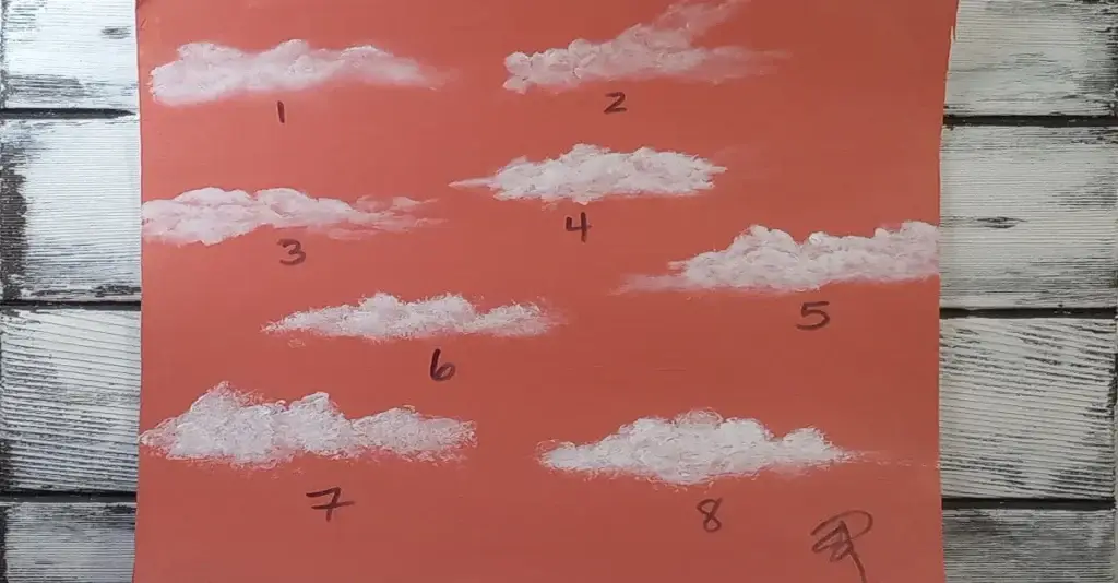 Eight white clouds painted on a peachy pink canvas. Each cloud is numbered and was painted using the different tools.