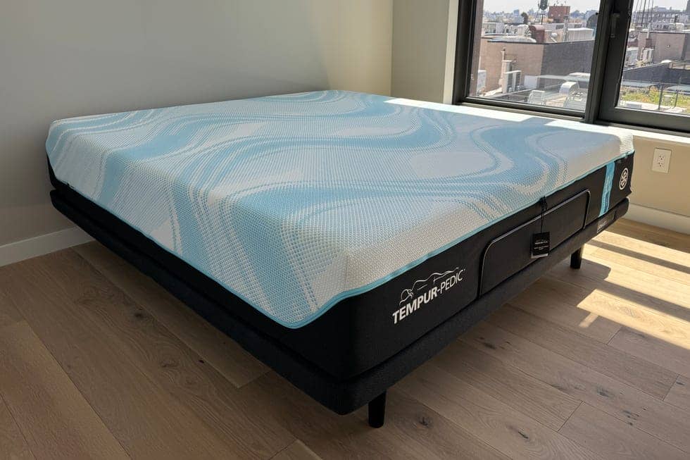 a luxe breeze mattress from tempur pedic in an empty bedroom setup