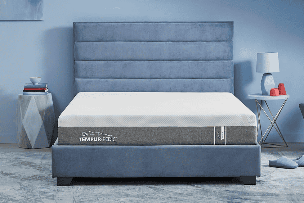 a tempurpedic mattress in a bedroom