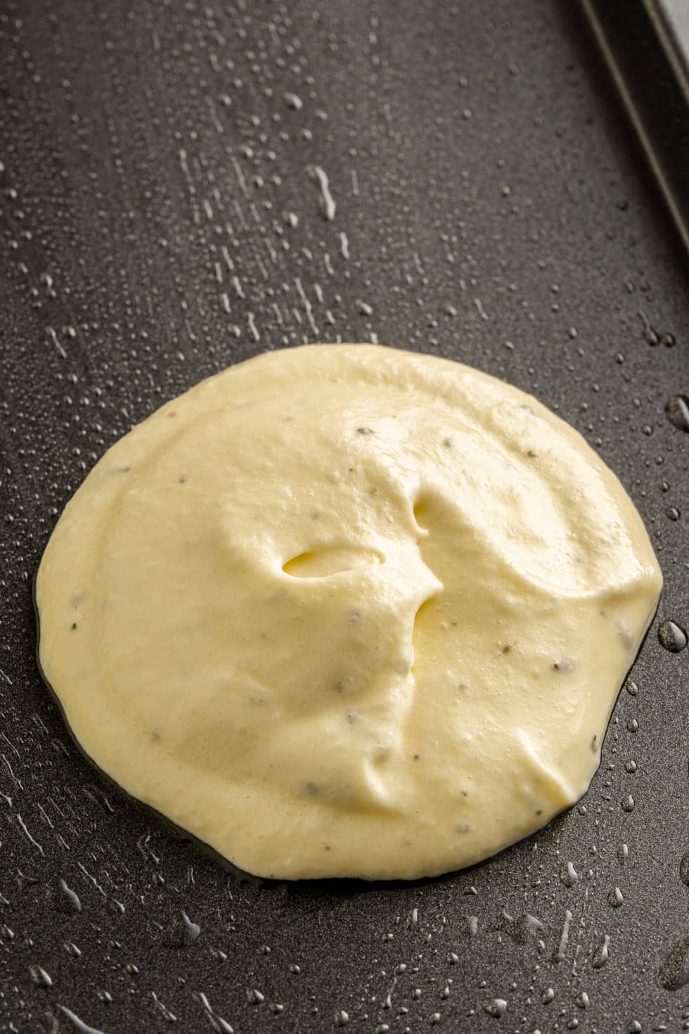 dollop of batter on baking sheet