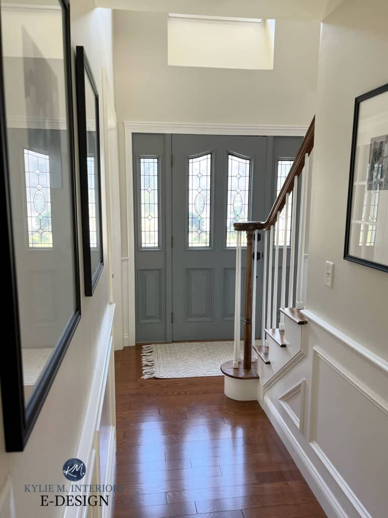 Sherwin Williams Tin Lizzie painted inside of front door, White Dove trim, Benjamin Moore Ballet White off white walls, golden red oak floor.