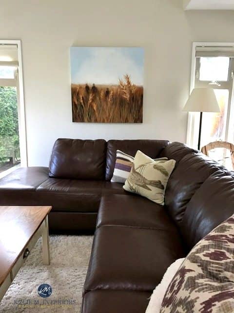 Benjamin Moore Ballet White with living room with brown leather sectional. Kylie M Interiors Online Decorating, E-design and Colour Consulting